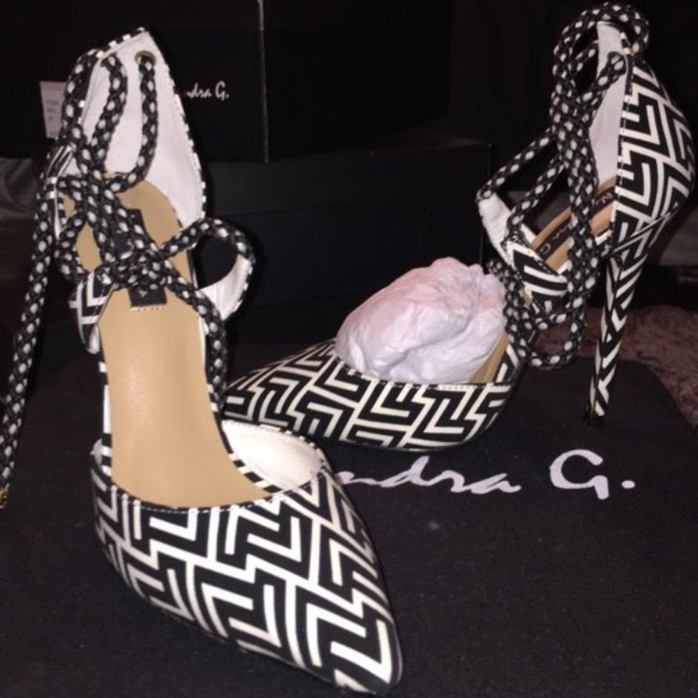 Alejandra G Heels